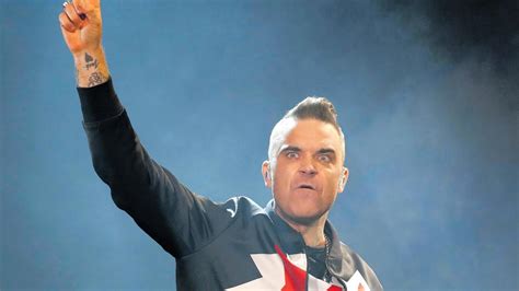 The Magic of Robbie Williams' Infectious Stage Energy